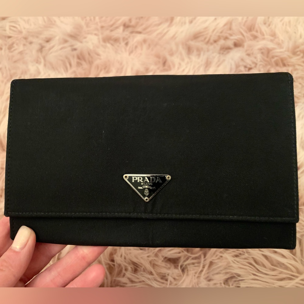 Authentic Prada wallet. Used but in good condition.